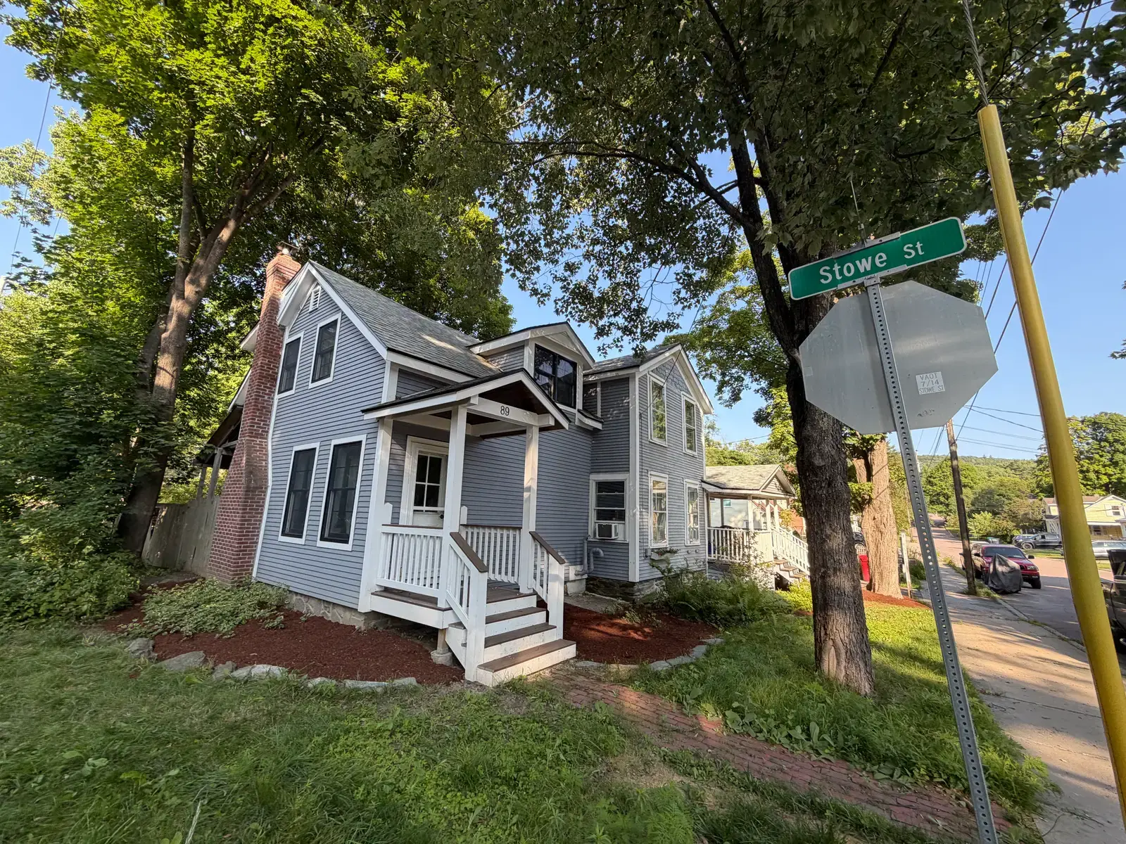 Corner village property with new beds and trimmed edges